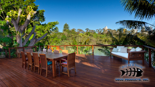 a patio with a couch and dining room