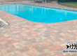 Brick overlay around a swimming pool
