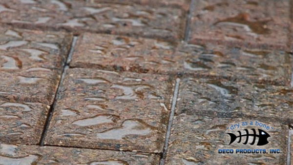 water droplets on a brick pavement