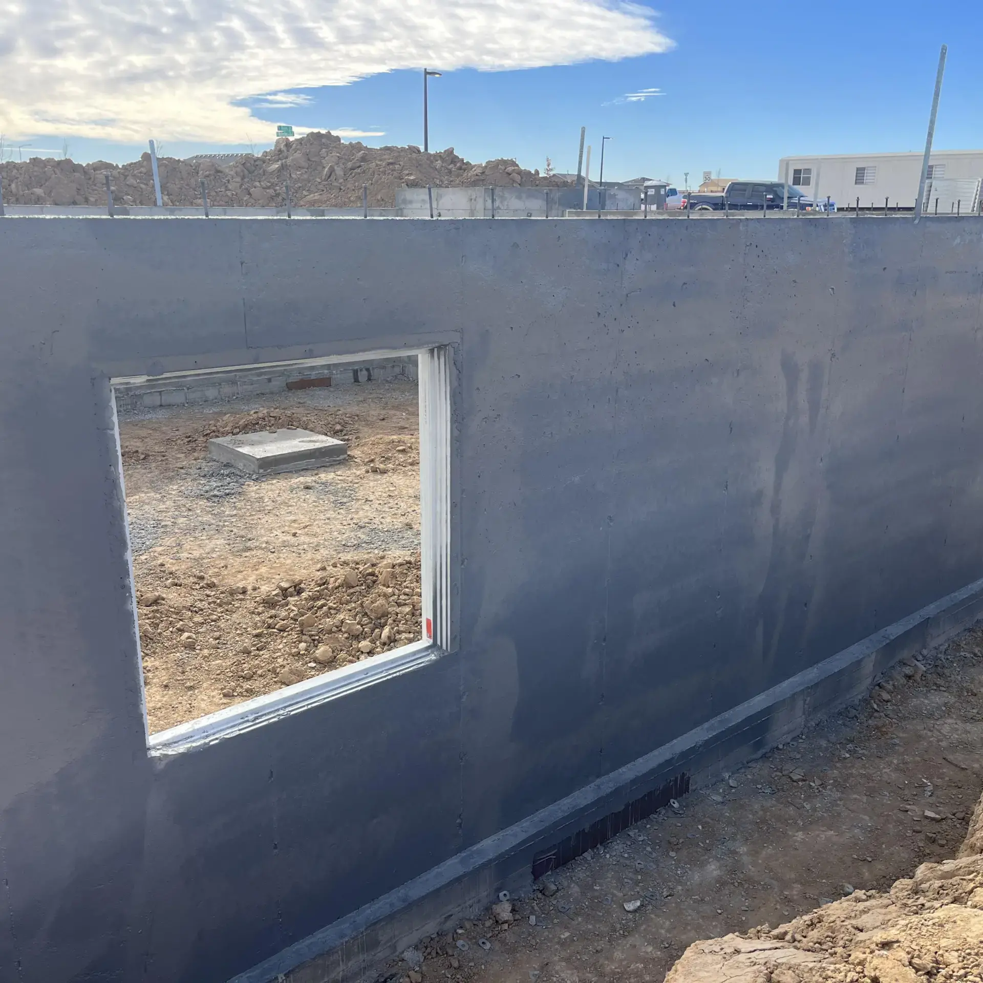 a close up image of a building under constructions with holes for windows