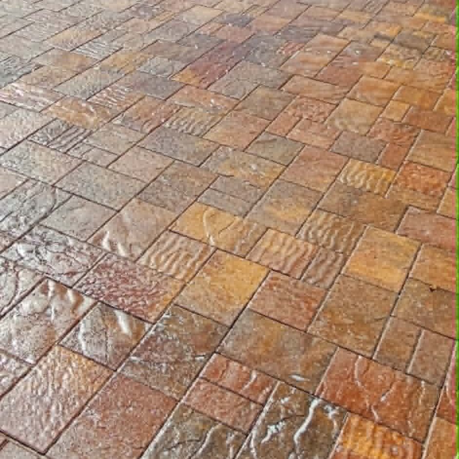 Red, tan and brown paver driveway with a glossy finish from Ure-a-Cast 1K urethane sealer.